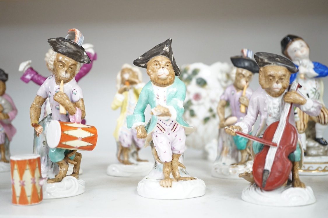 A nine piece German porcelain monkey band, a Meissen figure of a cherub together with other 19th century and later porcelain, largest 15cm high. Condition - varies